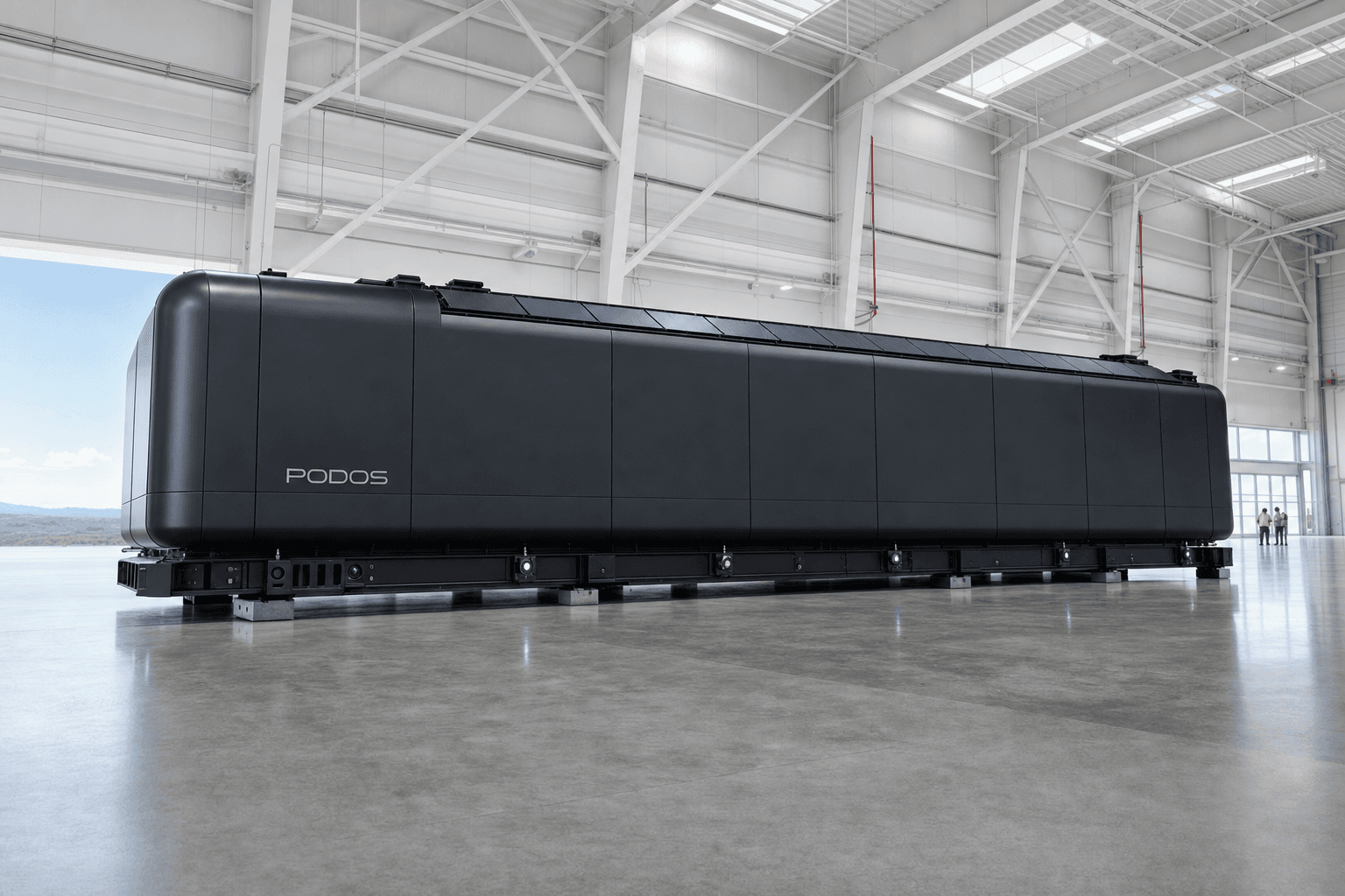 Monumental black PODOS unit inside a vast bright white architectural pavilion with tiny engineers for scale